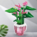 Pink palm tree flower building block potted plant